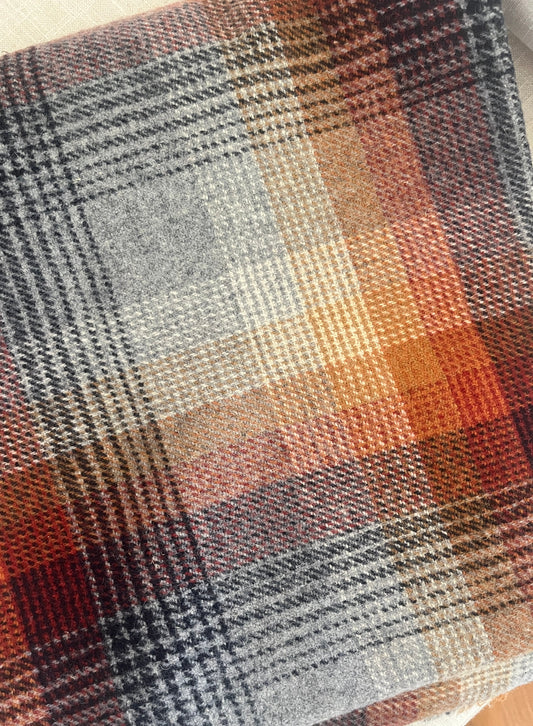 Close up of Pendleton Merced Plaid, a gold, red, and gray plaid.